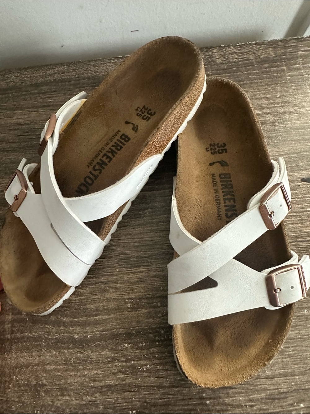 Birkenstock Kids White Crisscross Slide Sandals with Rose Gold Buckles